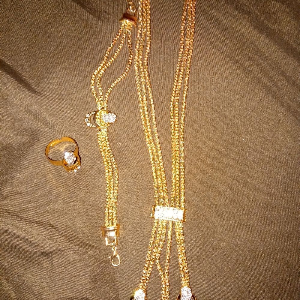 set of pair of earrings, ring and rusted necklace